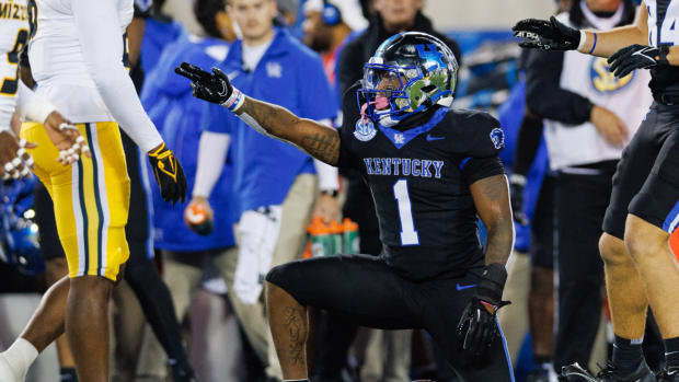 Oct 14, 2023; Lexington, Kentucky, USA; Kentucky Wildcats running back Ray Davis (1) celebrates after a run during the first quarter against the Missouri Tigers at Kroger Field. Mandatory Credit: Jordan Prather-USA TODAY Sports